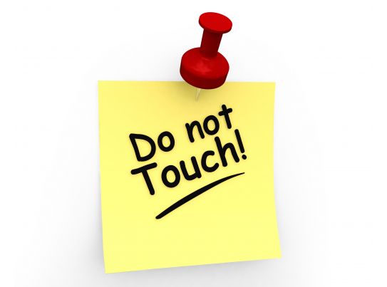 do_not_touch_text_on_sticky_note_stock_photo_Slide01
