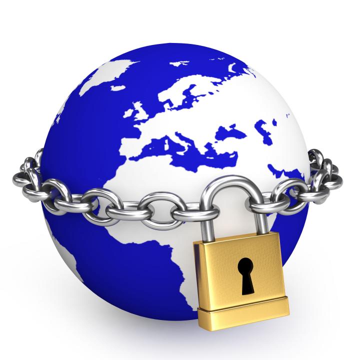 0914_blue_globe_with_golden_padlock_and_silver_chain_stock_photo_Slide01