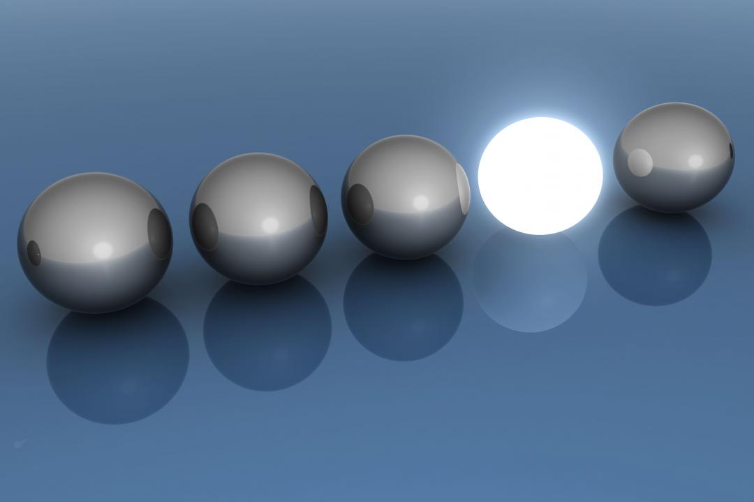 1114 bright glowing sphere in a row for leadership stock photo Slide01