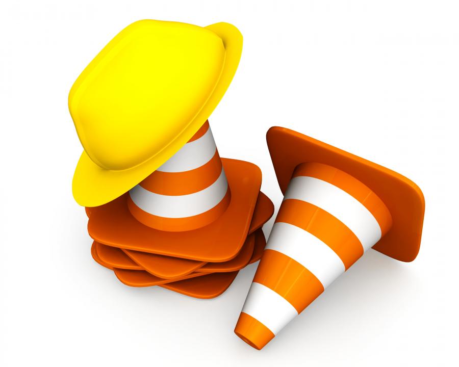1114 traffic cones with helmet for road safety stock photo Slide01
