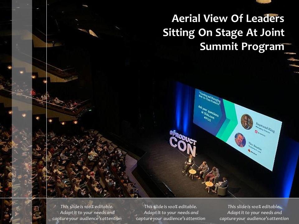 Aerial view of leaders sitting on stage at joint summit program Slide00