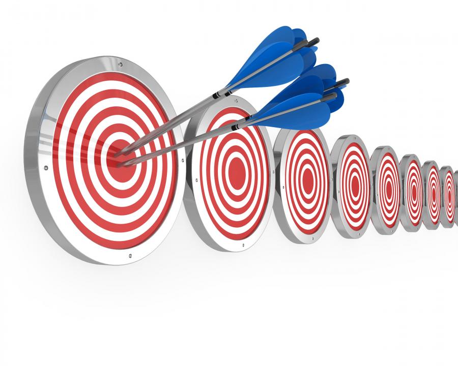 arrows_hit_on_target_board_showing_concept_of_meeting_goals_stock_photo_Slide01