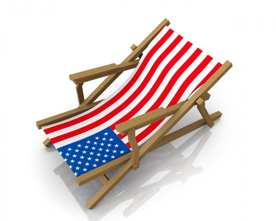 Beach chair with flag design stock photo Slide01