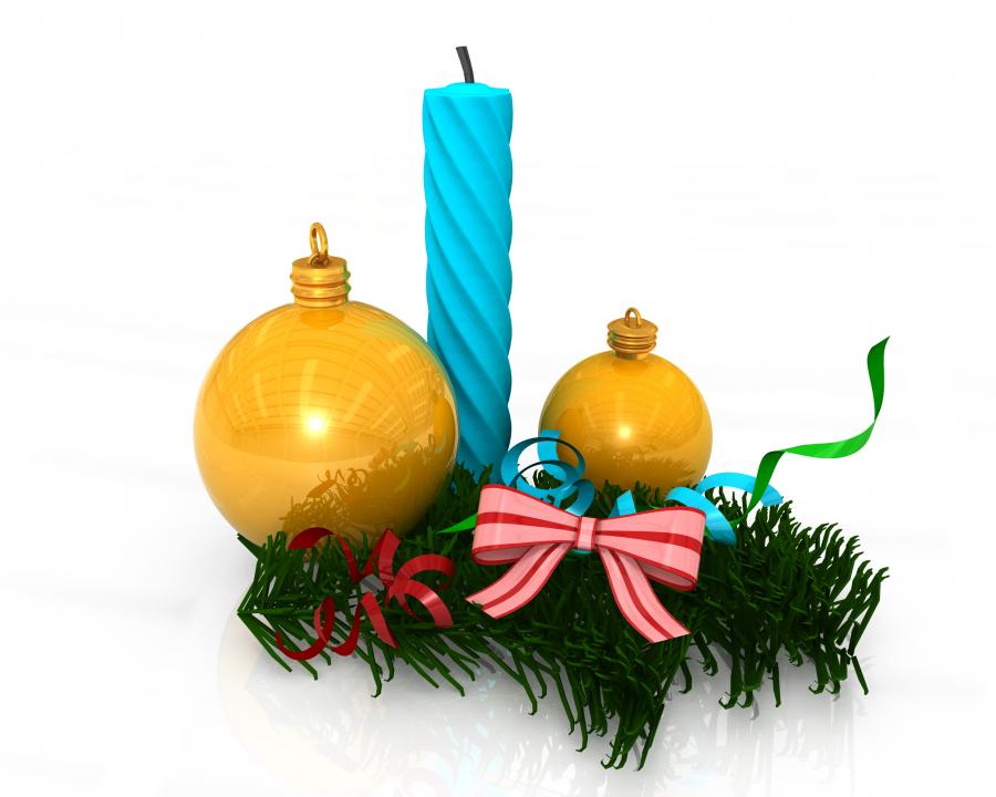 Blue candle with two golden decorative balls with bow and green grass stock photo Slide01