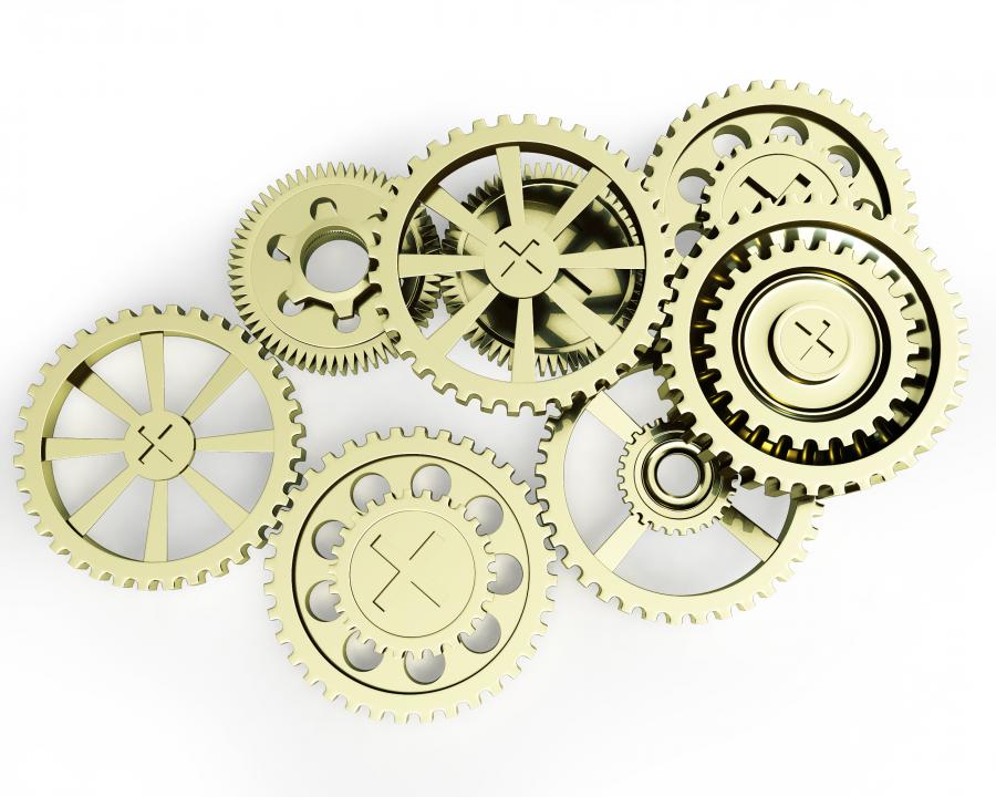 Group of gears working together stock photo Slide01