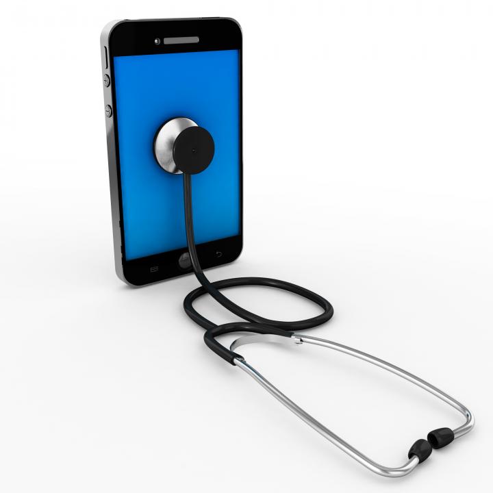 Mobile Phone With Stethoscope Showing Technology And Health Stock Photo