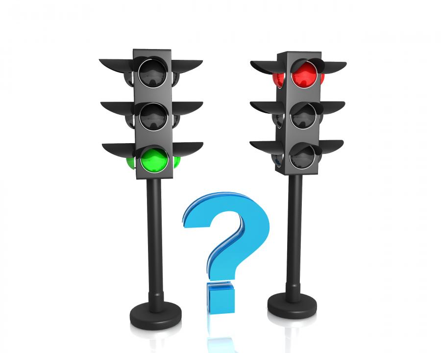 Question mark in between the traffic lights stock photo Slide01