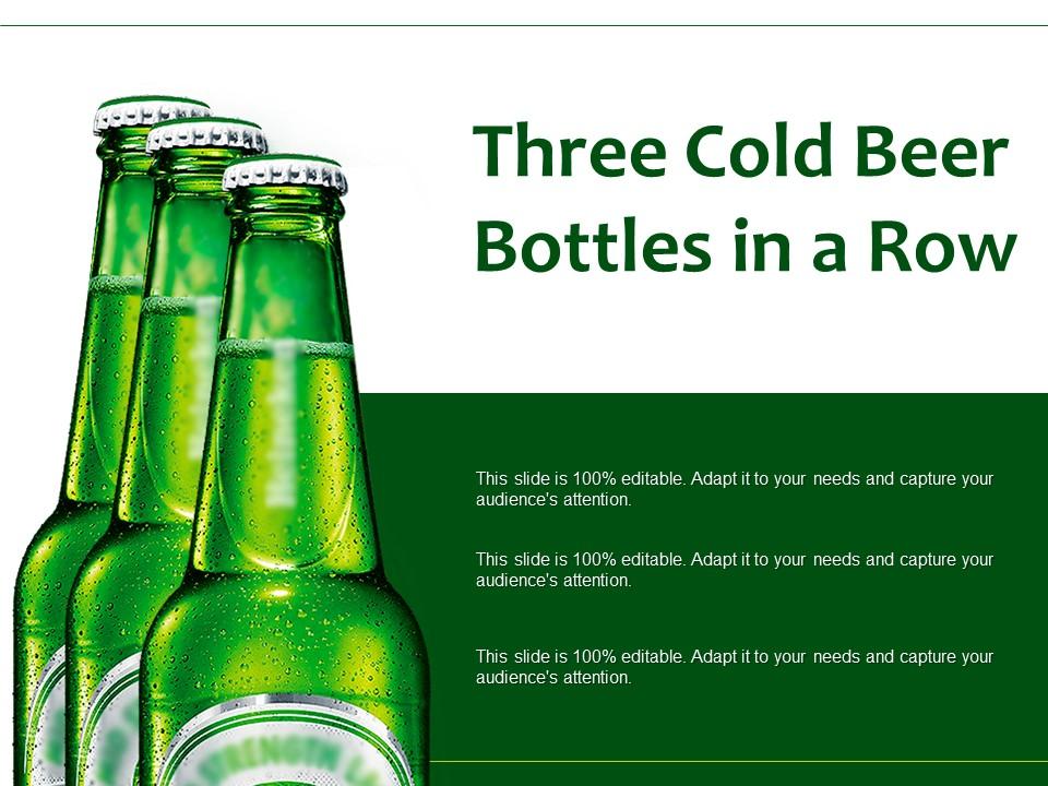 Three cold beer bottles in a row Slide01