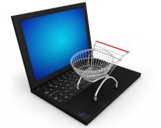 0115 shopping trolley on laptop stock photo