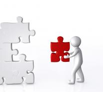 0914 3d man building a puzzle solution leader image graphic stock photo