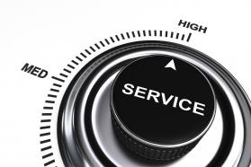 0914 arrow pointing at high level of service stock photo