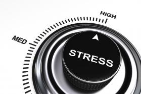 0914 arrow pointing at high level of stress stock photo