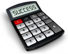 0914 calculator with success word on display stock photo