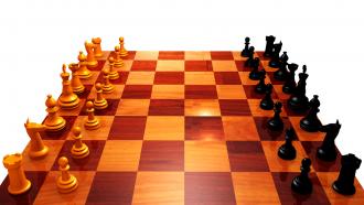 0914 Chess Pieces On Chess Board For Team Strategy Stock Photo