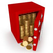 0914 gold coins falling out from red safe stock photo