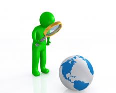 0914 green 3d man with magnifier on globe image graphic stock photo