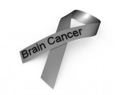 0914 grey ribbon for brain cancer awareness stock photo