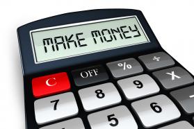0914 make money text on calculator with red button stock photo