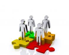 0914 men standing on puzzle pieces for teamwork stock photo