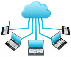 0914 network of laptops connected through cloud computing stock photo