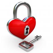 0914 padlock in shape of heart with key stock photo