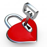 0914 padlock of heart shape with key stock photo