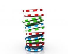 0914 poker gambling chips falling in pile symbol graphic stock photo