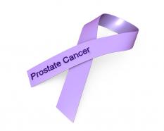 0914 purple ribbon for prostate cancer awareness stock photo