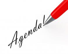 0914 red pen writing agenda for business stock photo