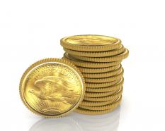 0914 stacking of american dollar coins with single standing coin image stock photo