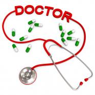 0914 stethoscope with doctor word and medical pills stock photo