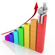 1114 3d bar graph with growth 3d man on top of the bar graph stock photo