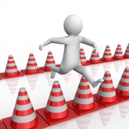1114 3d man jumping on traffic cones stock photo
