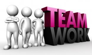 1114 3d team standing with teamwork text stock photo