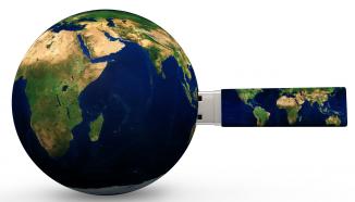 1114 globe and pen drive for global data storage stock photo