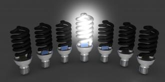 1114 one glowing cfl for leadership stock photo