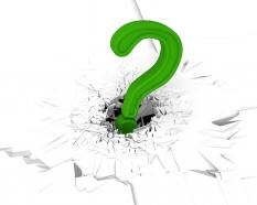 3d crack effect with green question mark stock photo