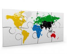 3d graphic of white puzzle with print of world map stock photo