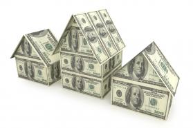3d house made of dollars stock photo