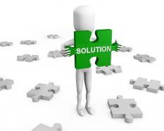 3d man holding puzzle of solution stock photo