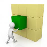 3d man pushing green cube to complete the structure stock photo