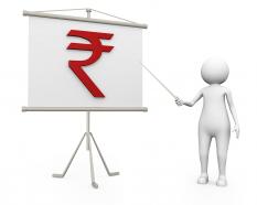3D Man Showing Rupee Symbol For Finance Stock Photo