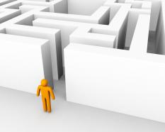 3d man standing in front of maze for problem solving stock photo