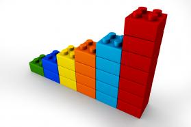 3d multicolored bar graph made by lego blocks stock photo