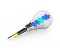 3d pen graphic of blue colored puzzles inside bulb stock photo
