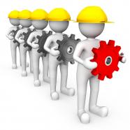 3d trademen in series with gears in hand one red gear for leadership stock photo