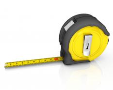 3d yellow black measuring tape for engineering stock photo