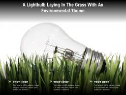 A lightbulb laying in the grass with an environmental theme
