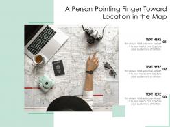 A Person Pointing Finger Toward Location In The Map