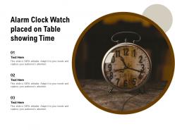Alarm clock watch placed on table showing time